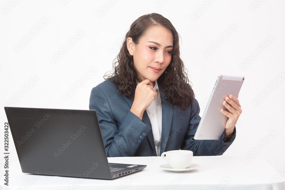 Beautiful young executive with her work and coffee Beautiful young executive with her work and coffee