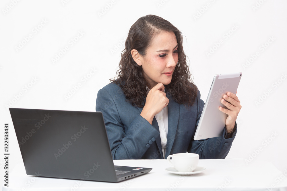 Beautiful young executive with her work and coffee Beautiful young executive with her work and coffee