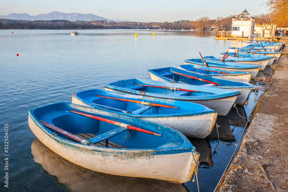 Docked rowboats for rent at Lake of Banyoles, Girona, Spain