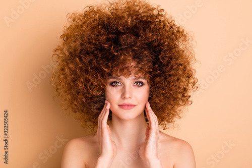 Close up photo beautiful she her no clothes nude lady smear wash scrub touch facial skin arm hand ideal condition curls fashion procedure stylist perms roller curlers isolated beige pastel background