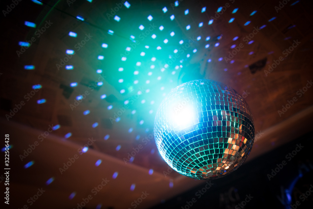 Shiny disco ball in a night club Shiny disco ball in a night club