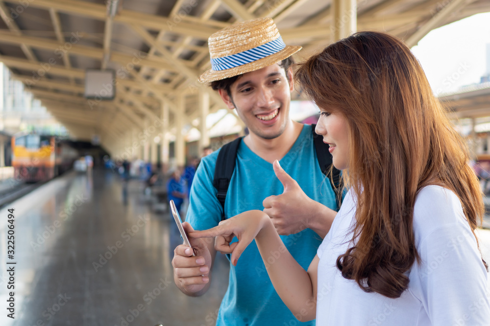 Asian woman speaking fluent foreign language with foreigner; concept of  communication with foreign language, foreign tourist or caucasian traveler,  language learning, language education training Stock Photo | Adobe Stock