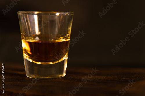 Close up whisky on dark background.