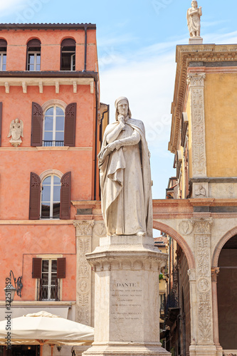 Verona, Italy. Dante Alighieri (1265-1321) is a writer, poet, and politician born in Florence, Aligiero di Bellincione. His marble statue, made in 1865 by Hugo Zannoni (1836 - 1919)