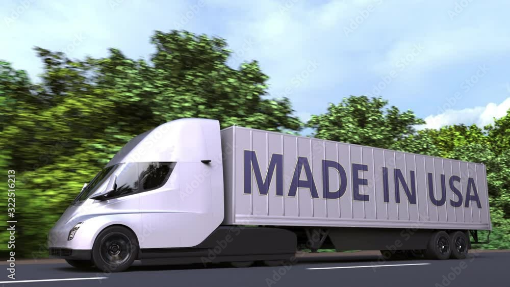 Modern electric semi-trailer truck with MADE IN USA text on the side. American import or export related loopable 3D animation Modern electric semi-trailer truck with MADE IN USA text on the side. American import or export related loopable 3D animation