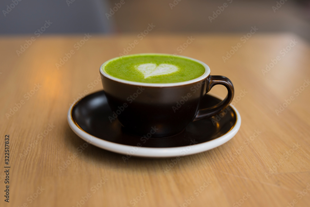 Matcha latte in a cup Matcha latte in a cup