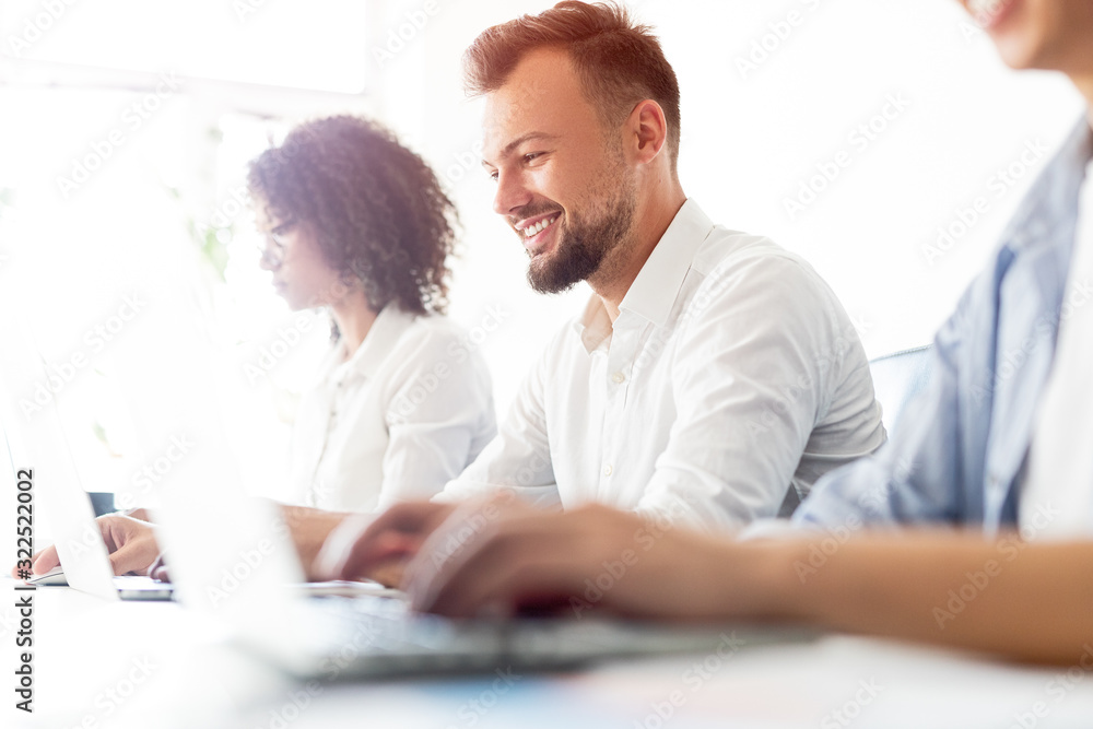 Cheerful support agent chatting with client Cheerful support agent chatting with client