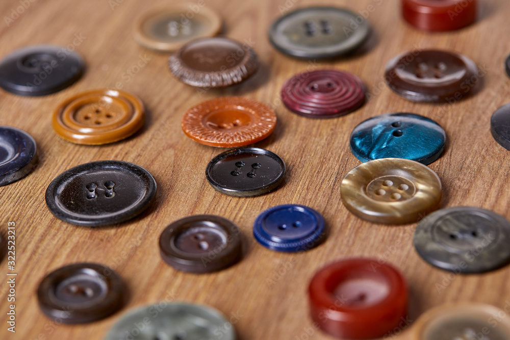 Background and texture of multicolored antique buttons Background and texture of multicolored antique buttons