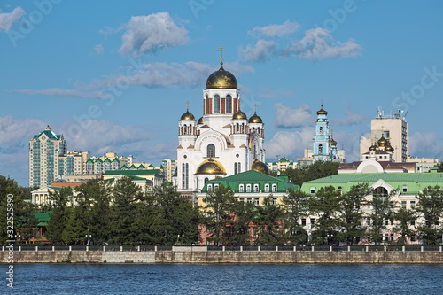 Yekaterinburg, Russia. Church on Blood, Ascension Church, Patriarchal Metochion and Rastorguyev-Kharitonov Palace. View from city pond. Text on facade reads: They have poured out their blood as water.