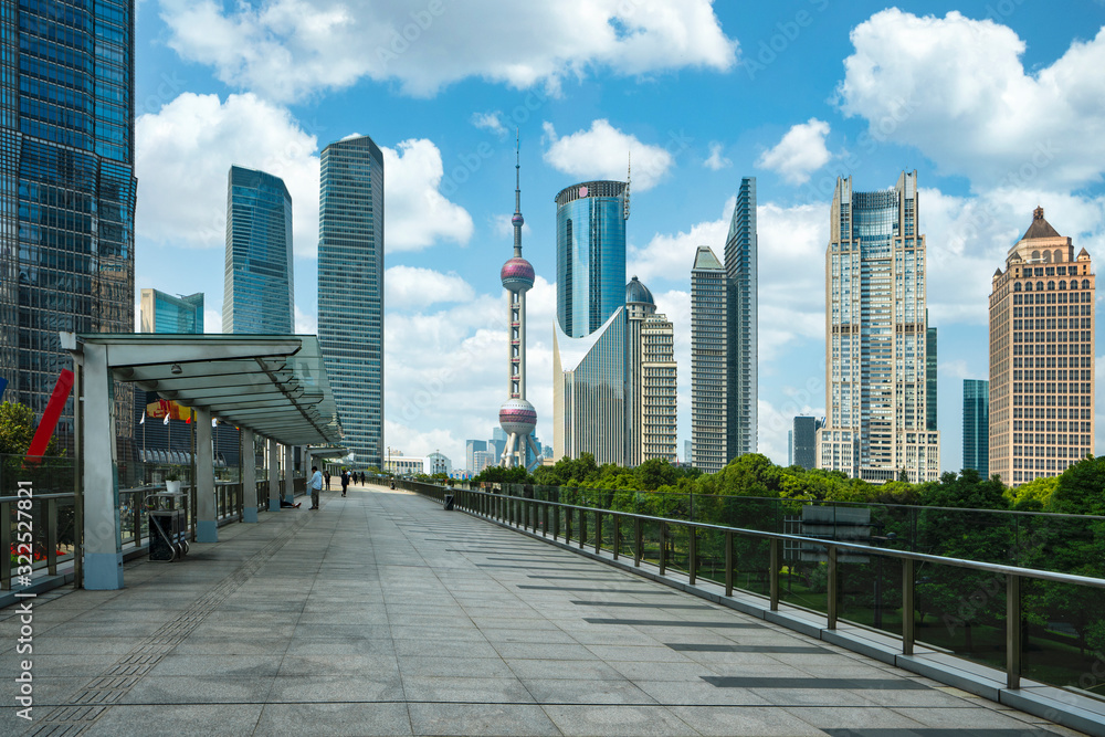 Cityscape of Shanghai city in day time with road and tower