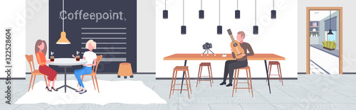 music blogger playing guitar live streaming musical blog concept african american man recording video using camera on tripod modern cafe interior horizontal full length vector illustration