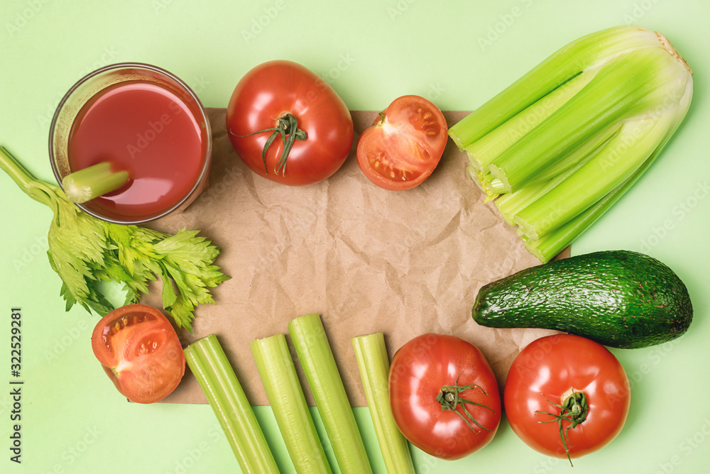 Background or Flat Lay with Glass of Tasty and Healthy Tomatoes and Celery Juice Raw Tomatoes Celery and Avocado on Green Background Top View Flat Lay Copy Space Background or Flat Lay with Glass of Tasty and Healthy Tomatoes and Celery Juice Raw Tomatoes Celery and Avocado on Green Background Top View Flat Lay Copy Space