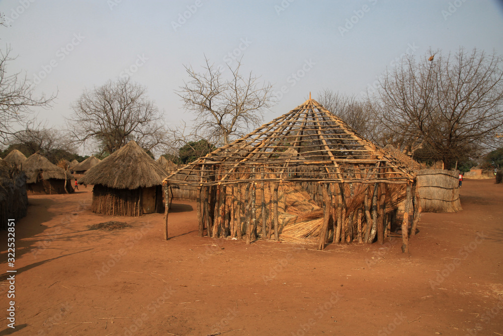 tradycyjne afrykańskie chaty - obrazy, fototapety, plakaty 