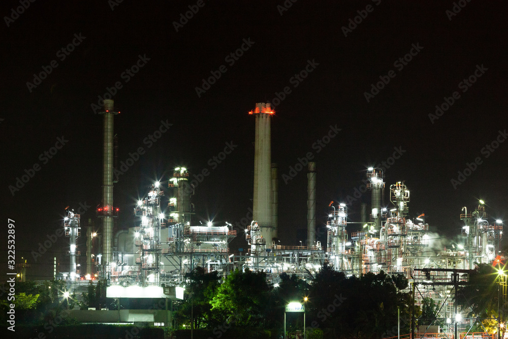 Fototapeta premium Oil refinery environmentally friendly, with sky and clouds, river