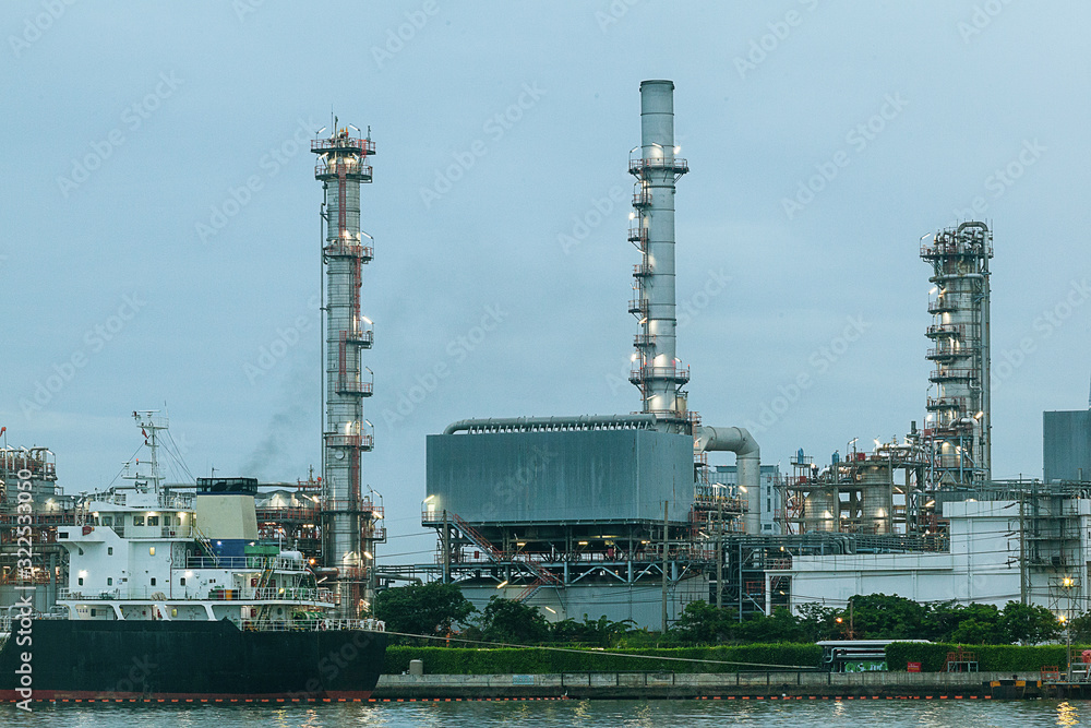 a standard and eco-friendly refinery, surrounded by rivers and sky, covered with clouds