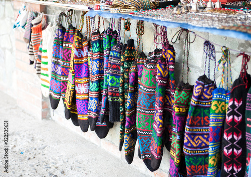 Woolen socks with a national pattern are sold on the street market in Georgia