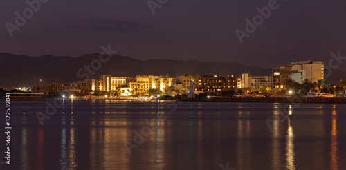 Sunset in Aqaba city  view of Eilat city in Israel. Aqaba city  Jordan