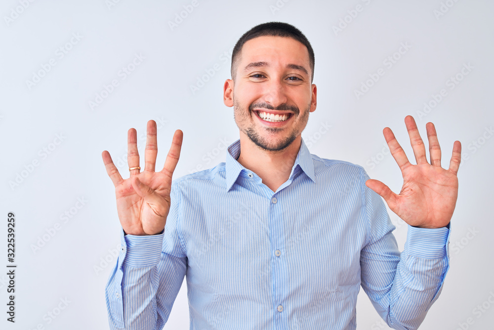 Young handsome business man standing over isolated background showing and pointing up with fingers number nine while smiling confident and happy. Young handsome business man standing over isolated background showing and pointing up with fingers number nine while smiling confident and happy.