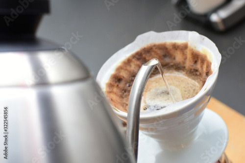 Drip coffee, melitta method with Colombian coffee photo