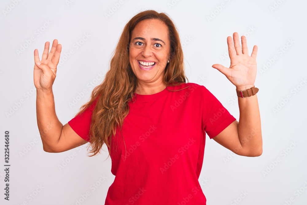 Middle age mature woman standing over white isolated background showing and pointing up with fingers number nine while smiling confident and happy. Middle age mature woman standing over white isolated background showing and pointing up with fingers number nine while smiling confident and happy.
