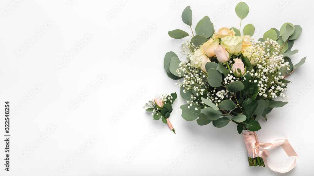 Naklejka premium Floral composition, wedding roses with ribbon, boutonniere