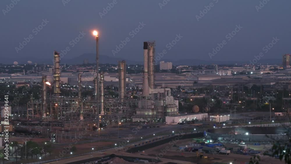 Oil refinery in industrial estate at twilight Oil refinery in industrial estate at twilight