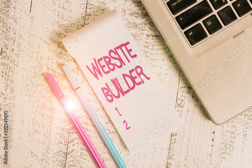 Text sign showing Website Builder. Business photo text construction of websites without analysisual code editing Trendy laptop blank ruled notepad pens lying wooden rustic vintage table photo