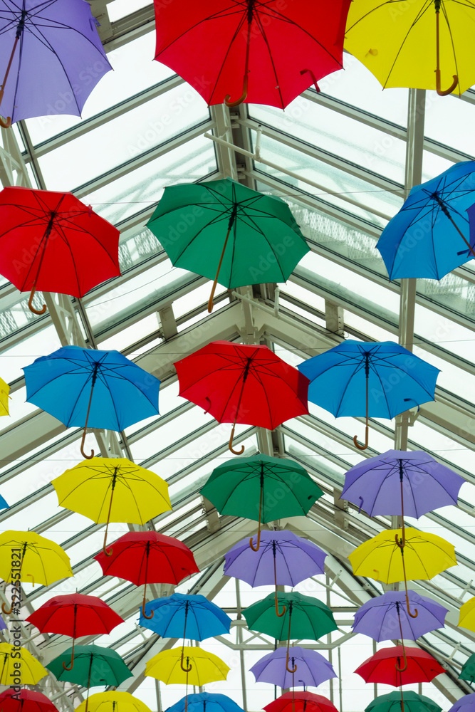 Colourful Umbrellas As Decoration In The Air With Glass Ceiling Celebration and Decoration