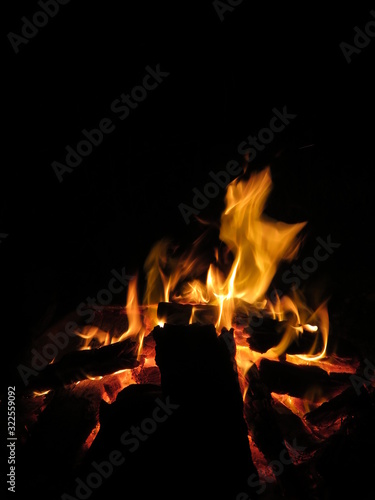 Flames and sparks of fire on a black background