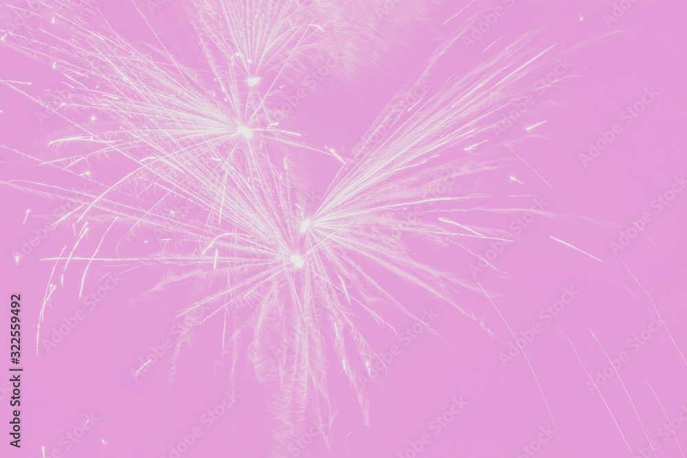Fototapeta premium Pink abstract background with fireworks pattern, copy space