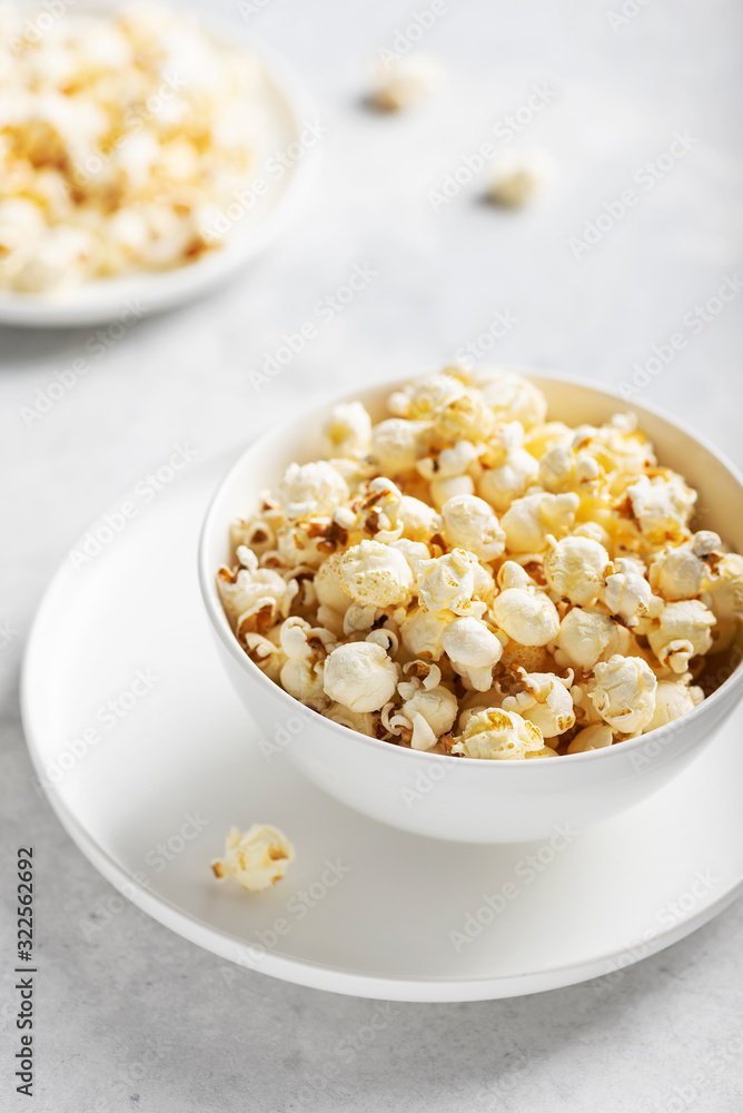 Salt popcorn in the light bowl Salt popcorn in the light bowl