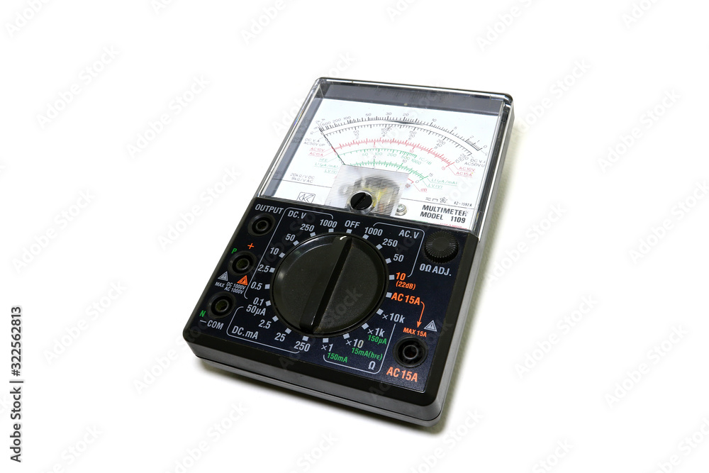 Analog black multimeter Laying on a white background. Lumphun Thailand : 24 January 2019 Analog black multimeter Laying on a white background. Lumphun Thailand : 24 January 2019