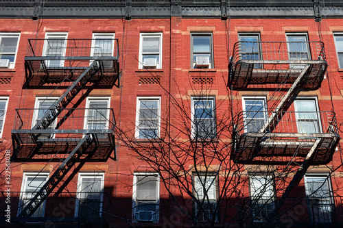 Old Red Brick Buildings in Greenwich Village New York with Fire Escapes