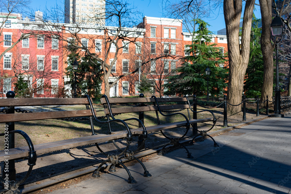 Empty Wood Bench at Washington Square Park in New York City during the Winter