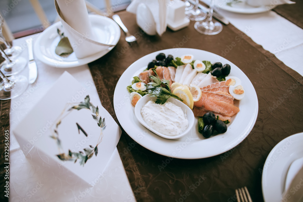 Food on table in rectourant, salad with seafood and vegetables Food on table in rectourant, salad with seafood and vegetables