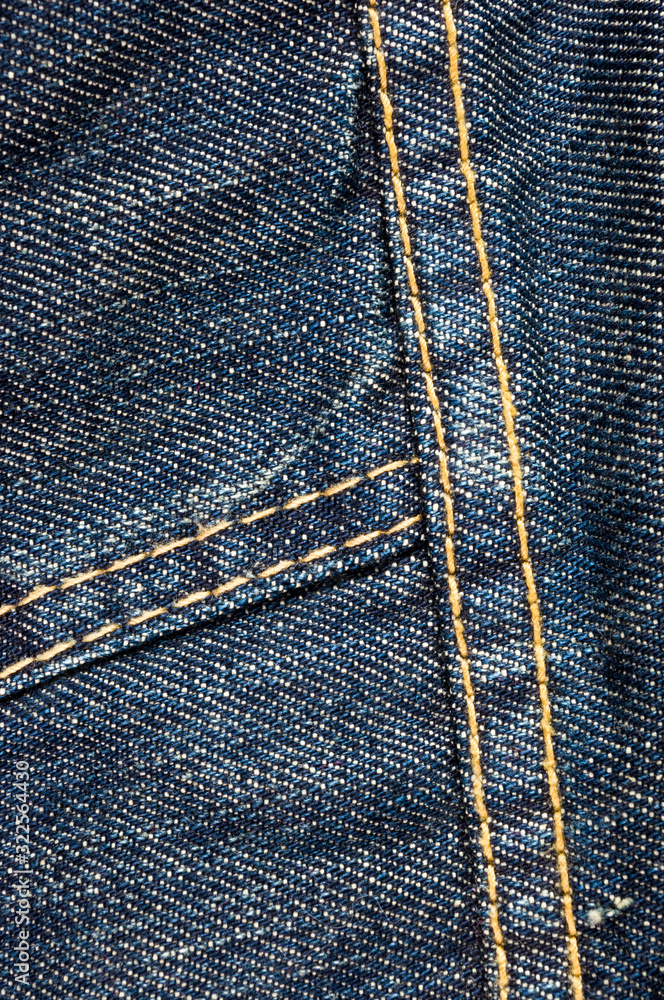 clothing items blue stonewashed faded jeans cotton fabric texture with seams, clasps, buttons and rivets, macro, close-up clothing items blue stonewashed faded jeans cotton fabric texture with seams, clasps, buttons and rivets, macro, close-up