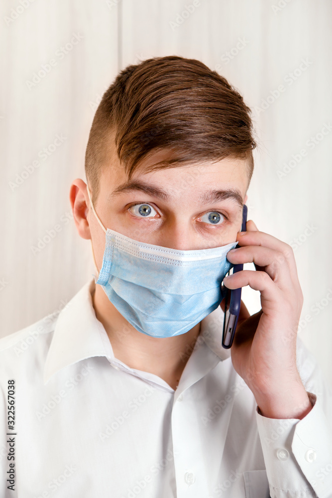 Young Man in Flu Mask