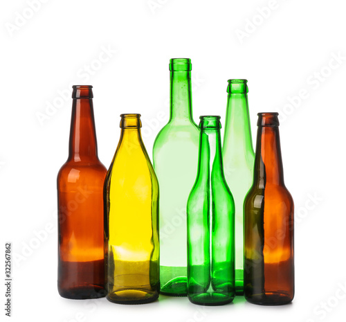 Glass bottles on white background. Recycling concept