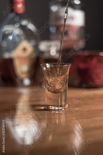 liquid that runs in shot glass, old school look