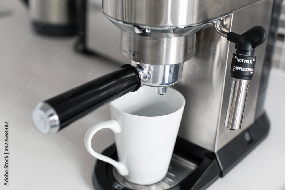 Close-up of making coffee in a coffee machine. Close-up of making coffee in a coffee machine.
