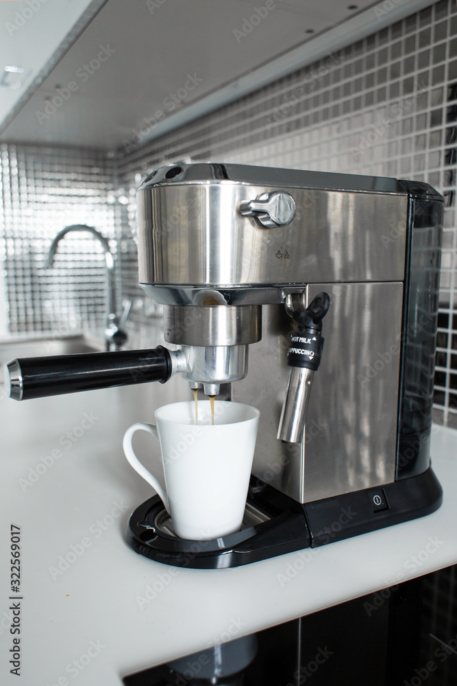 Close-up of making coffee in a coffee machine. Close-up of making coffee in a coffee machine.