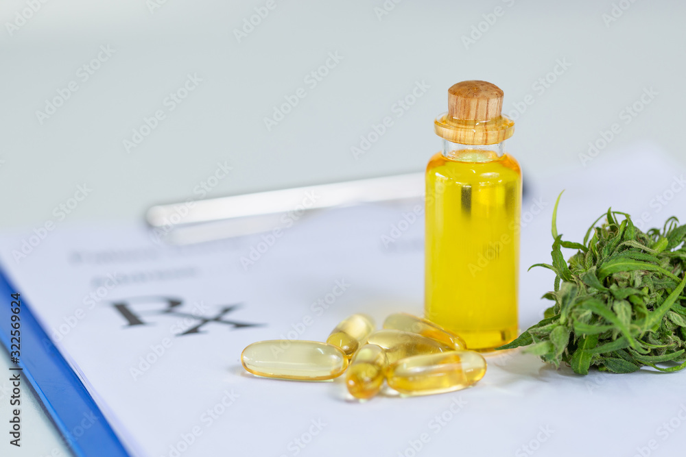 CBD hemp oil is placed on a doctor's prescription. CBD oil salad tablets put on the table, alternative medicine concepts, natural herbs, treatment. CBD hemp oil is placed on a doctor's prescription. CBD oil salad tablets put on the table, alternative medicine concepts, natural herbs, treatment.