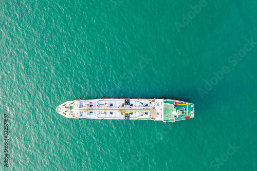 Aerial top view of the ship carrying the lpg and oil tanker in the sea port. For energy export and import business for transportation © Sunday Stock