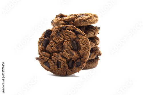 A stack of chocolate chip cookies crunchy delicious sweet meal and useful biscuits isolated on white background. Homemade pastry.