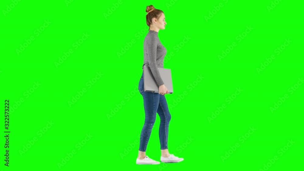 Casual Female Walking With Documents Green Screen Casual Female Walking With Documents Green Screen