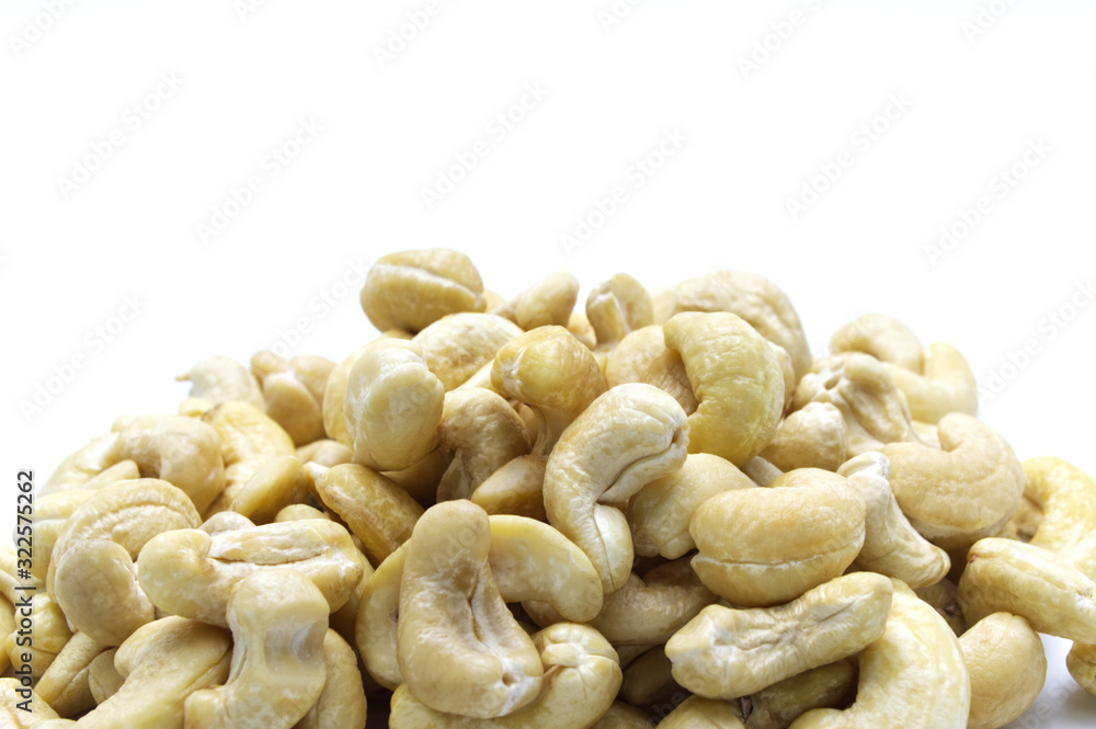 Pile of Cashews nut salty roasted food ingredient natural on white background. Pile of Cashews nut salty roasted food ingredient natural on white background.