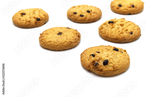 Chocolate chip cookies set on white background. Sweet biscuits delicious and crunchy homemade pastry.