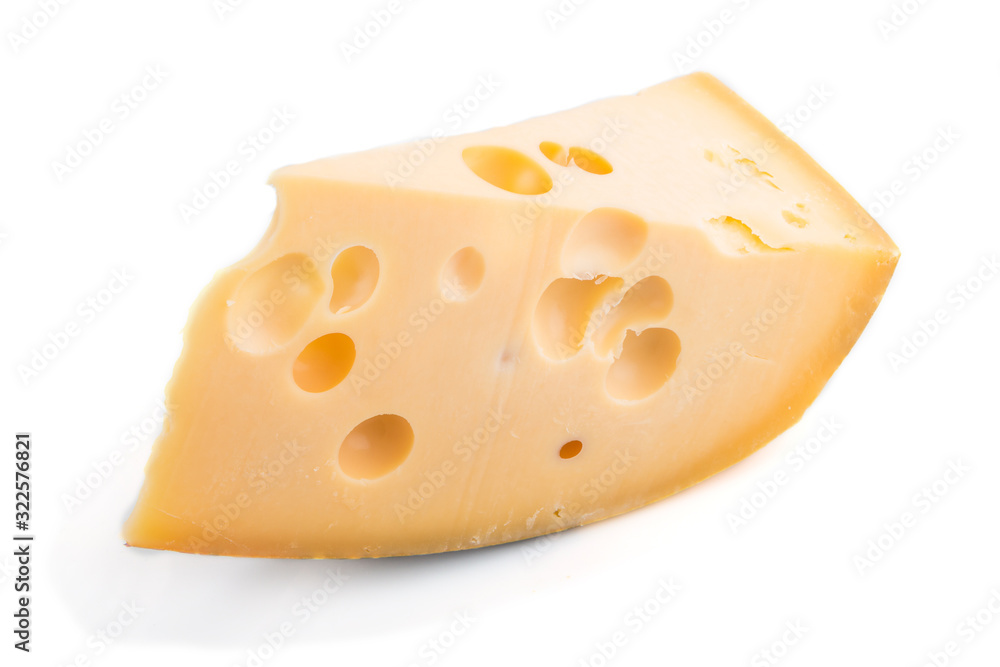 Piece of yellow cheese isolated on white background. Side view. Piece of yellow cheese isolated on white background. Side view.