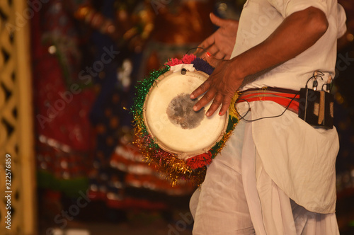 Artist perform with indian music instrument dhol in open stage f