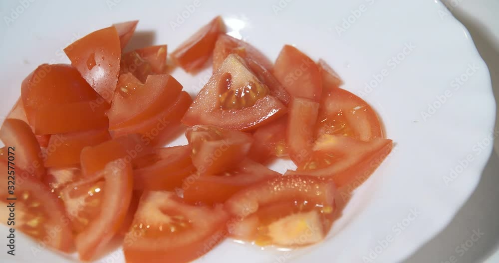 Cooking - Chopped tomatos on plate in kitchen